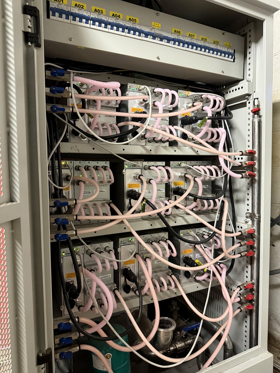 Liquid cooled ASIC mining cabinet